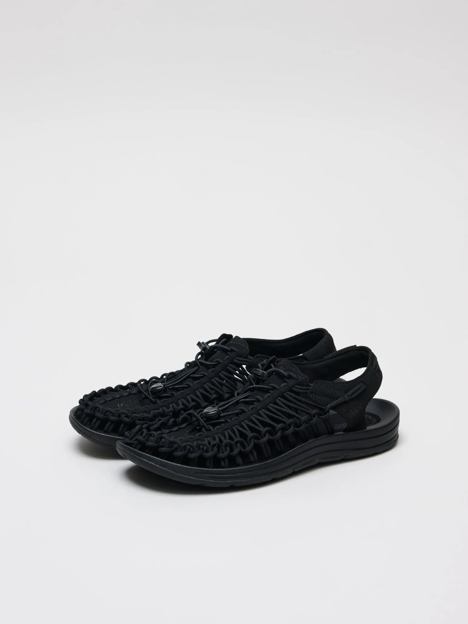 Uneek, Black/Black